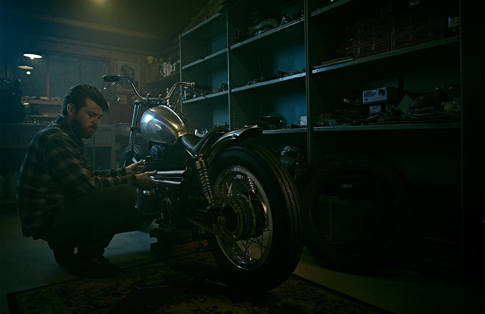 Sam at Inglorious Motorcycles working in his workshop