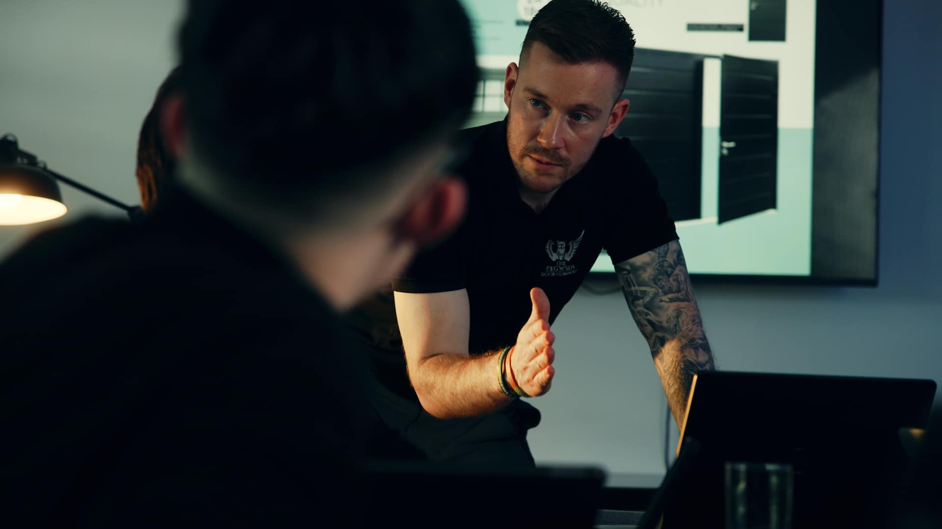 Managing Director leading a meeting