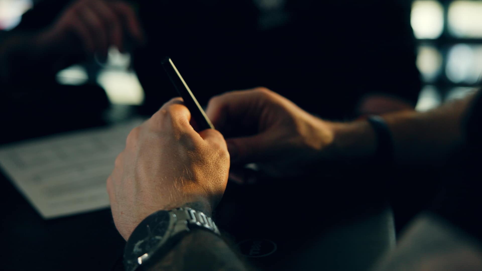 Close up of a pen in hands during a meeting